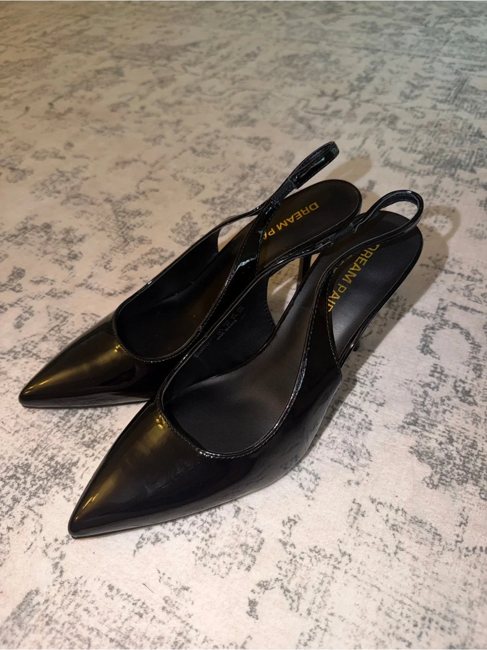 black slingback closed-toe kitten heels